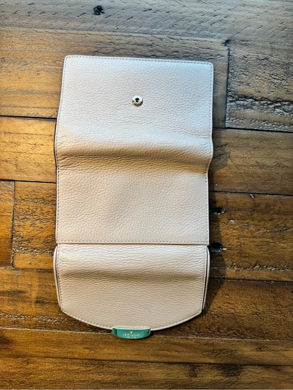 kate spade Cream Pebbled Leather Wristlet with Gold-Tone Plaque